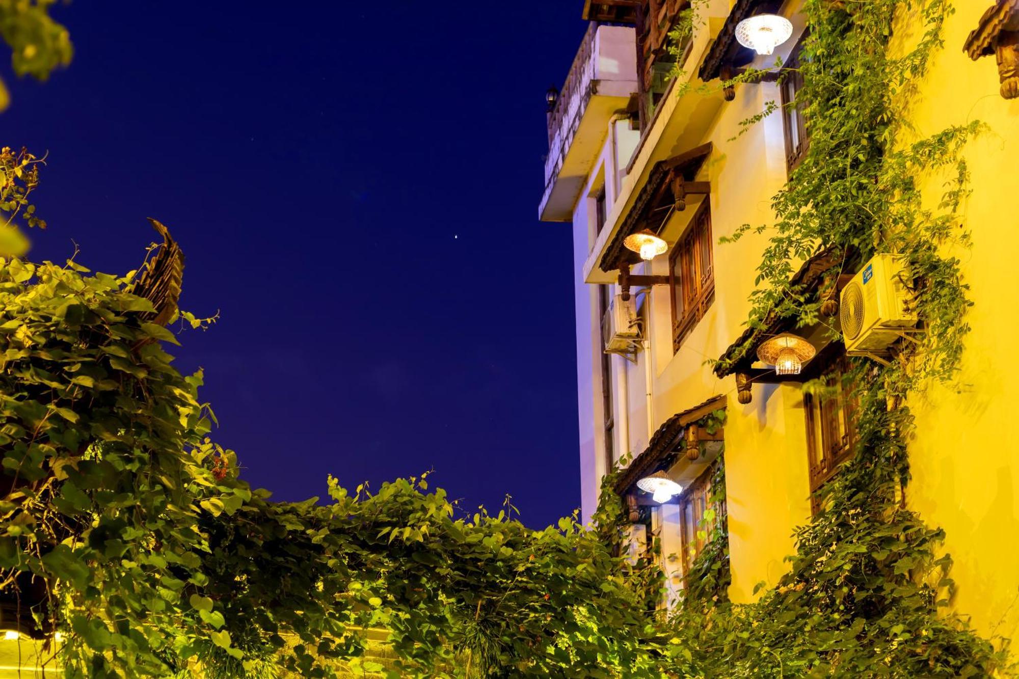 Butterfly Flowers Inn Чжанцзяцзе Екстер'єр фото
