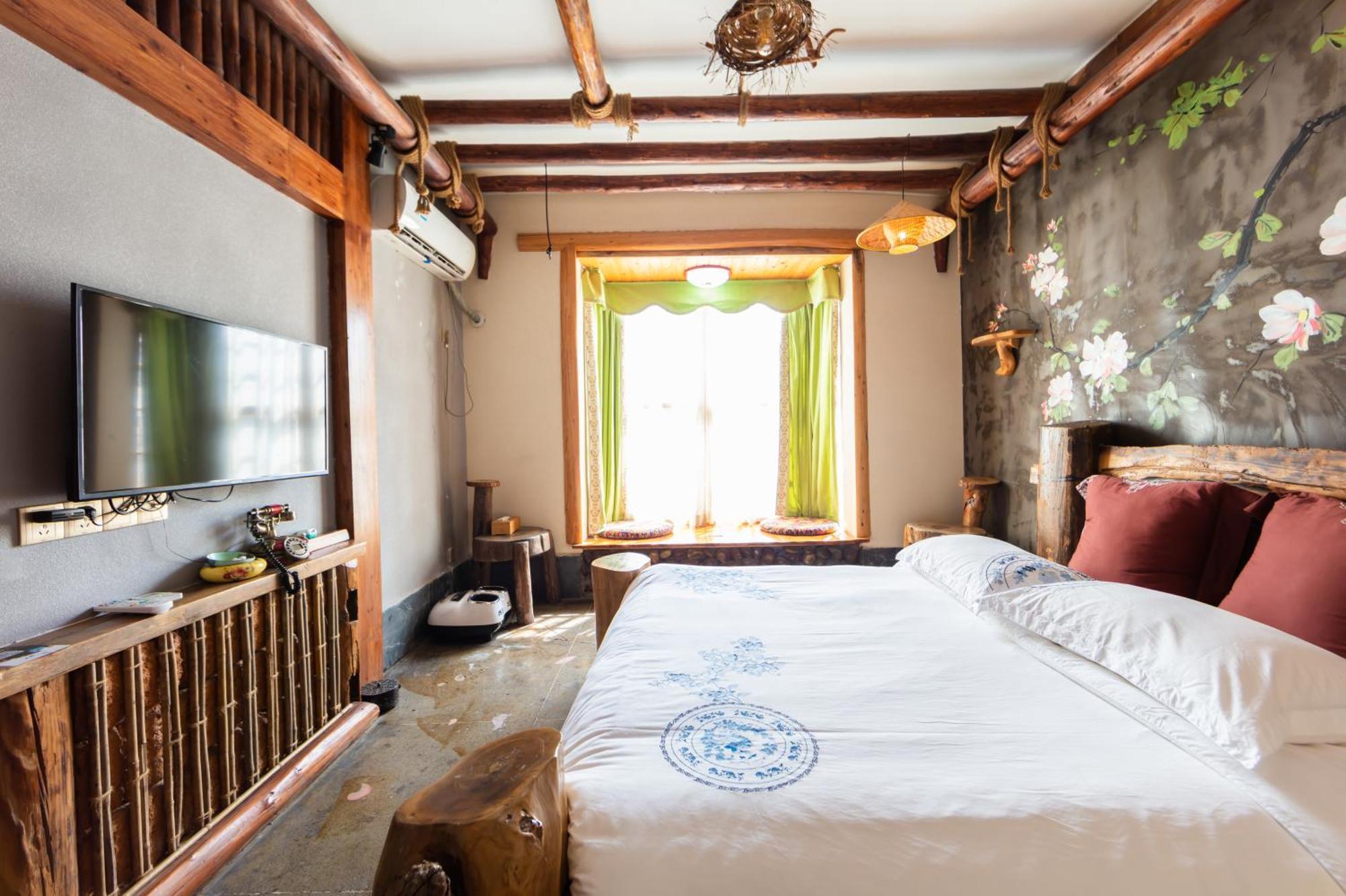 Butterfly Flowers Inn Чжанцзяцзе Екстер'єр фото