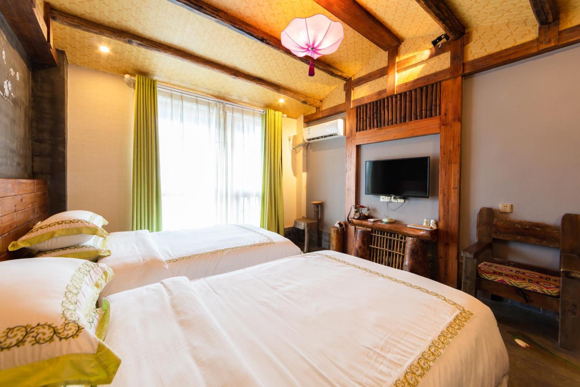 Butterfly Flowers Inn Чжанцзяцзе Екстер'єр фото