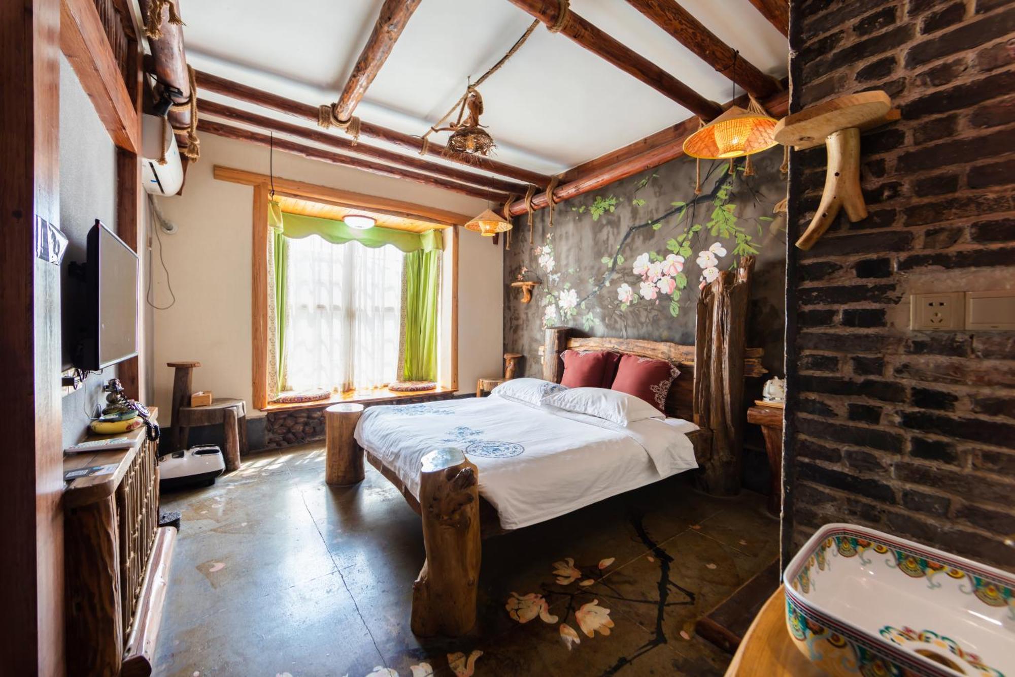 Butterfly Flowers Inn Чжанцзяцзе Екстер'єр фото
