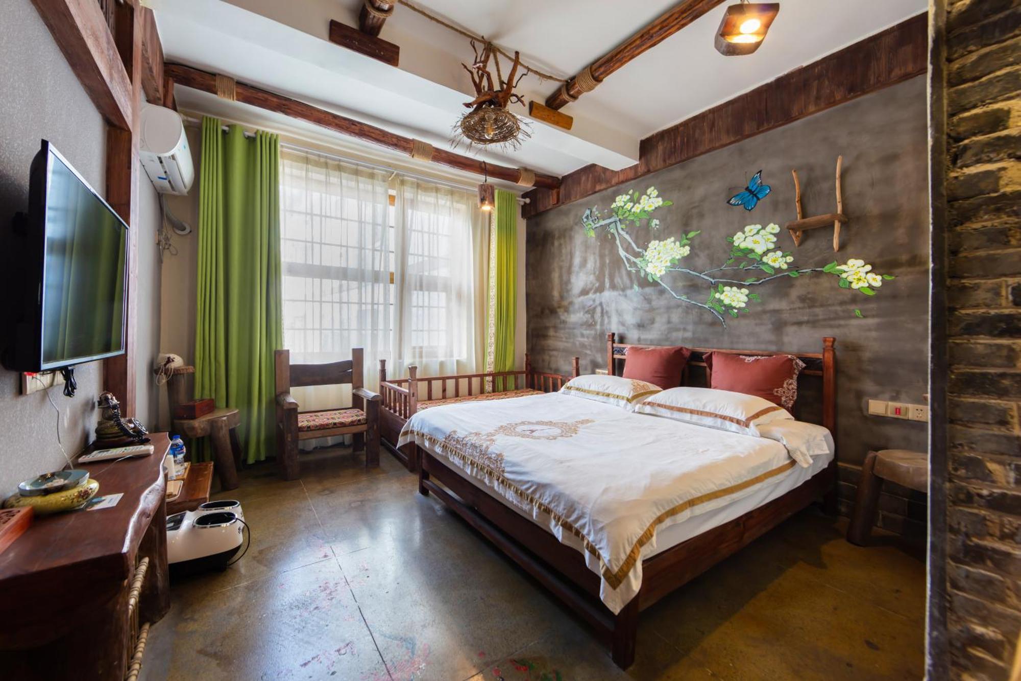 Butterfly Flowers Inn Чжанцзяцзе Екстер'єр фото