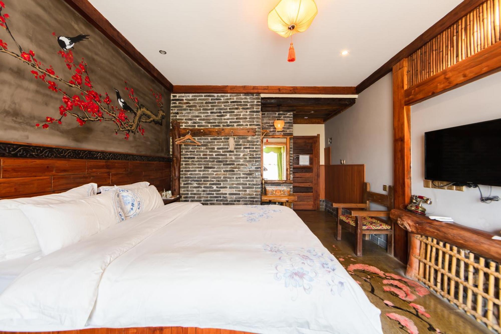Butterfly Flowers Inn Чжанцзяцзе Екстер'єр фото