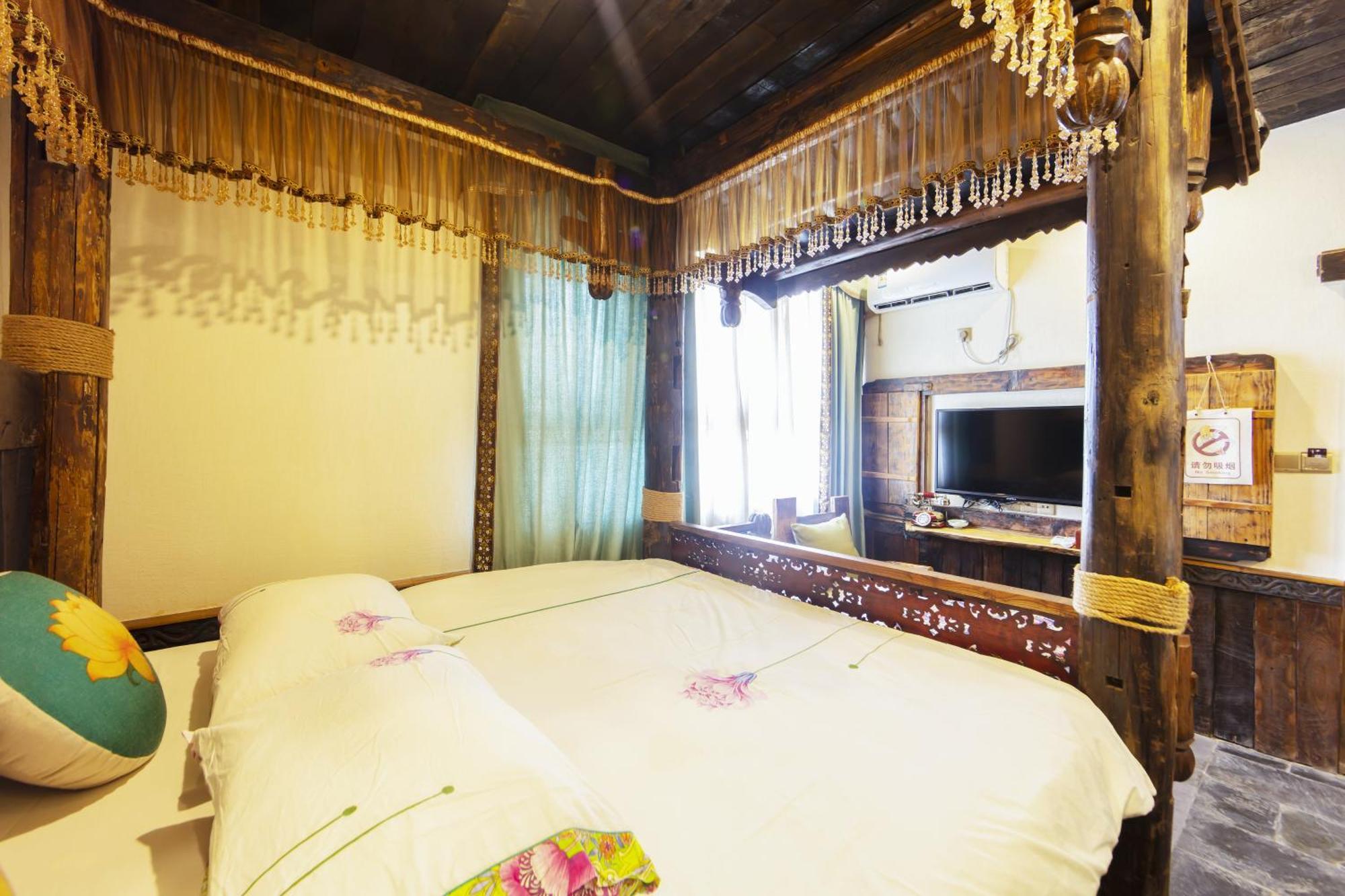 Butterfly Flowers Inn Чжанцзяцзе Екстер'єр фото