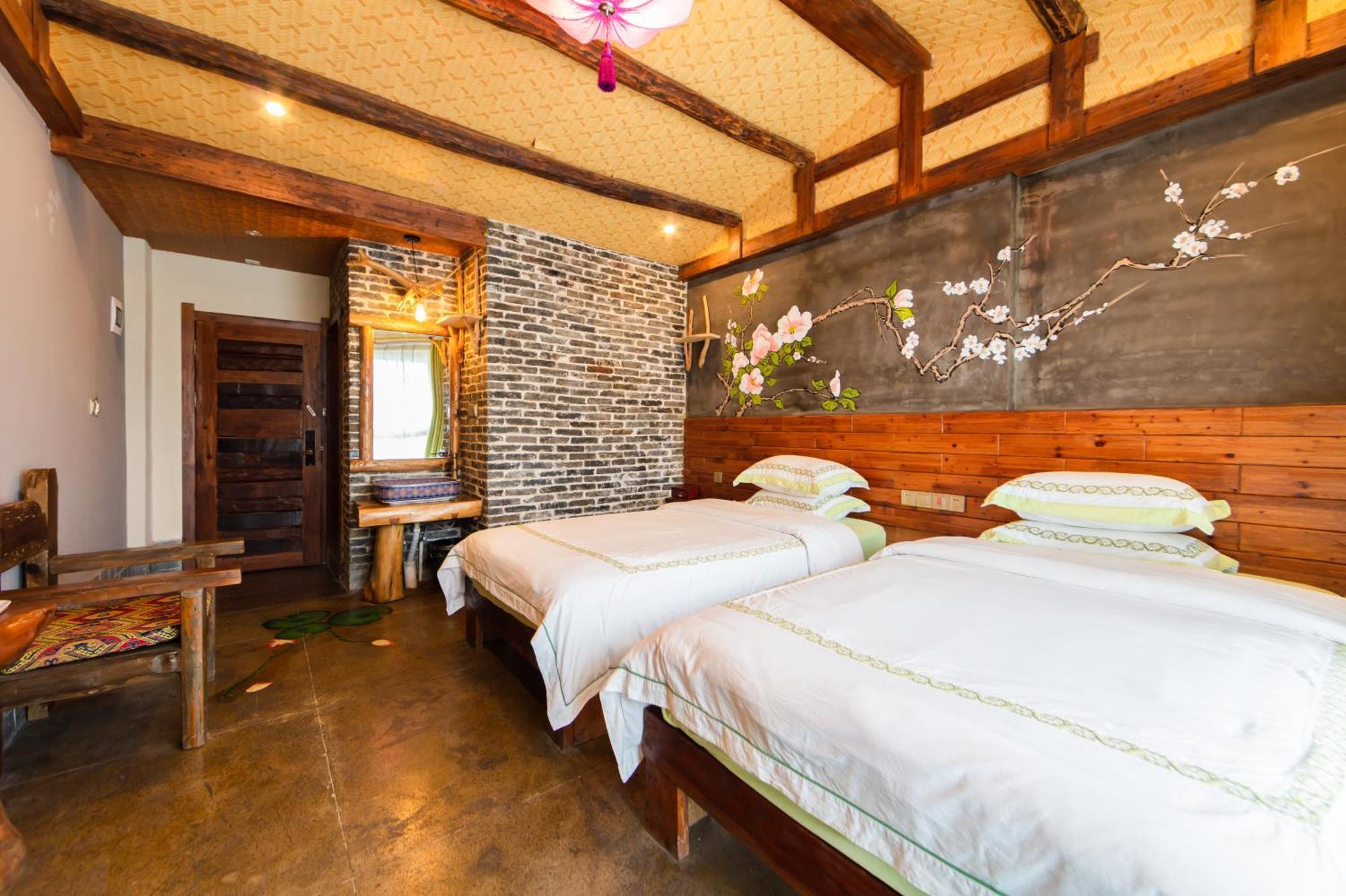 Butterfly Flowers Inn Чжанцзяцзе Екстер'єр фото
